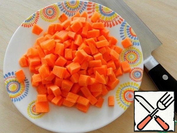 Peel one medium-sized carrot and cut into cubes with a side of 0.5 cm.