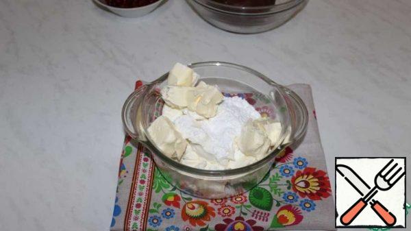 Add powdered sugar and butter to the cream cheese.