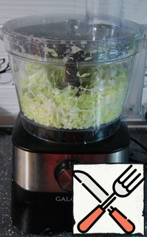 Chop the cabbage. I used the food processor .