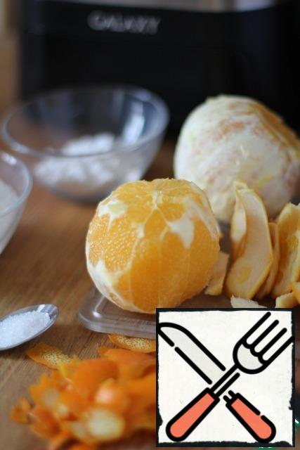 Remove the zest from one orange. Both citrus peel off the white skin. Cut the white middle to remove the bitterness.