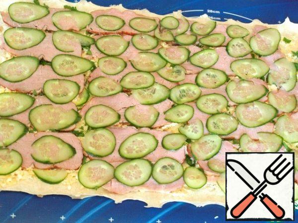 Also, thinly slice the cucumber and spread it on top of the balyk.