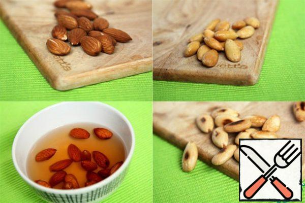 Pour boiling water over the nuts, let them stand for 3-5 minutes, peel them and fry them well.