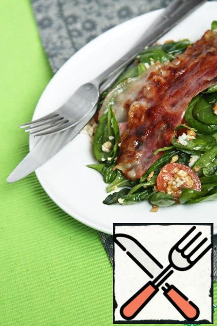 Fry the bacon and put it on top of the salad.