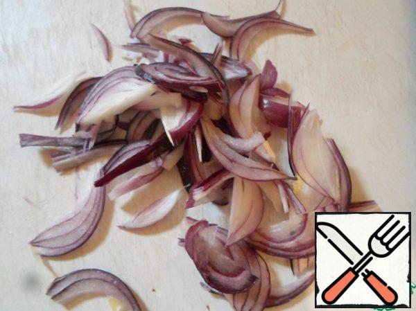 Onions are also finely cut into half rings.