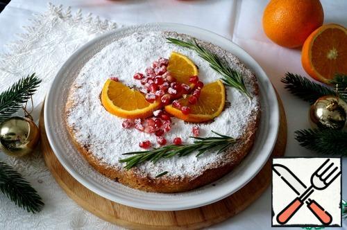 Mix 2 tablespoons of sugar and orange juice.
Directly in the form of pierce semolina cake in several places, pour the juice with sugar.