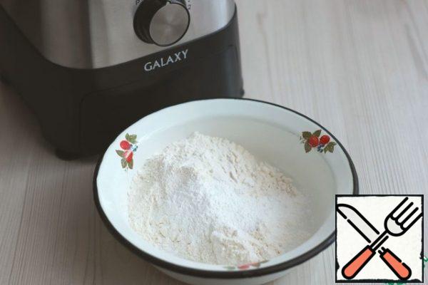 In a bowl, combine the dry ingredients: flour (130 gr.), baking powder (1 teaspoon), salt (1 pinch).