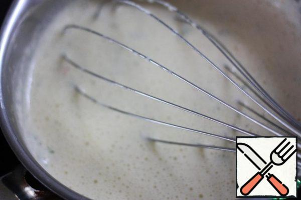 Pour back into the saucepan, add the cornstarch, salt and pepper and cook over medium heat, stirring with a whisk for 3-4 minutes.
Remove and cover.