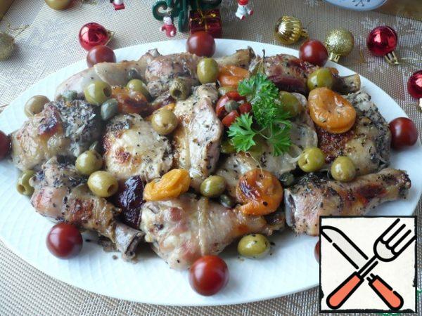 Serve the chicken spread out on a serving platter with capers, olives and plums. The sauce can be poured into a gravy boat.Bon Appetit!