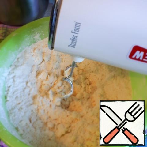 Mix butter or margarine (at room temperature) with flour,
I do this using a mixer with hook-like attachments.