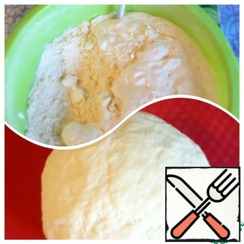 Add sour cream with yeast, salt and knead the dough. Flour is different, so look at the consistency of the dough, you may need more.
