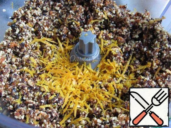 Grind for another 15-20 seconds until smooth. Add the orange zest and stir.