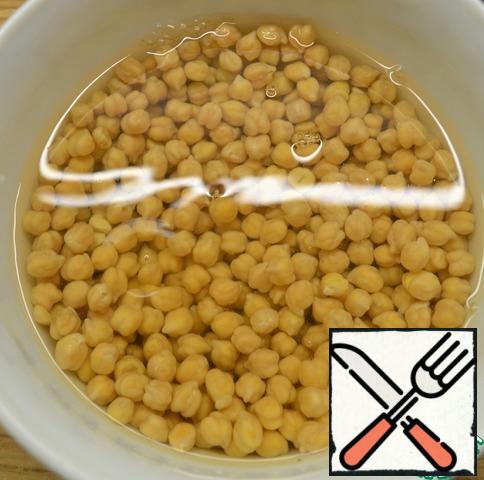 Soak chickpeas overnight. Drain the water in which the chickpeas were soaked and add a new one, so that the chickpeas cover 5 cm. Cook for 1-1. 5 hours. Do not drain the remaining water. Chill the chickpeas.