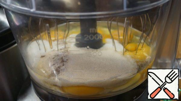 In the bowl of the combine, beat the eggs, add salt, pepper, kefir, semolina and your favorite seasoning. I added Italian herbs.