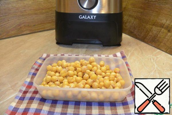 Boil the chickpeas until tender. You can boil it a little.