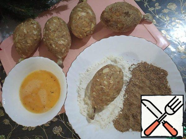 Roll each cutlet first in flour, then dip in an egg (beat the eggs with a fork with a pinch of salt until smooth), then roll in breadcrumbs.