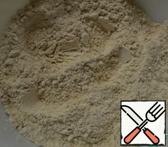 Sift the flour with baking powder and spices.