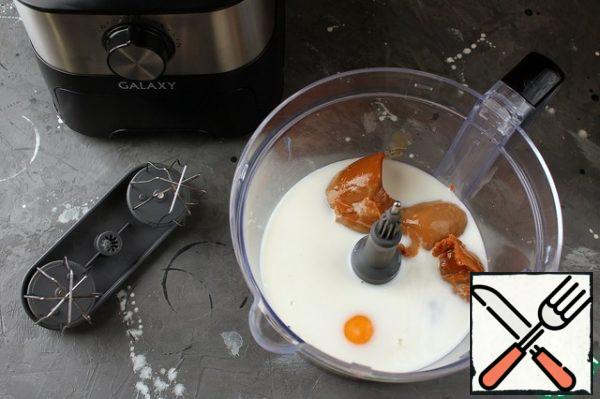 In the bowl of a food processor combine milk, eggs and condensed milk. Beat with a whisk attachment until smooth.