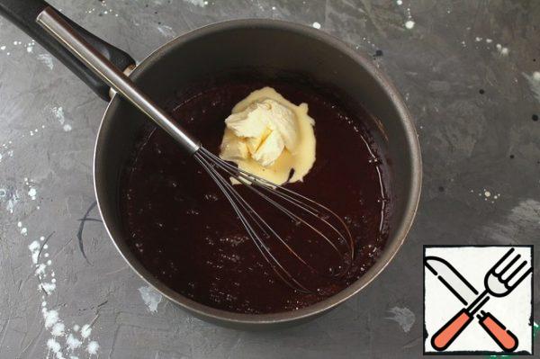 Remove from the heat and immediately add the butter. Mix thoroughly and let cool slightly.