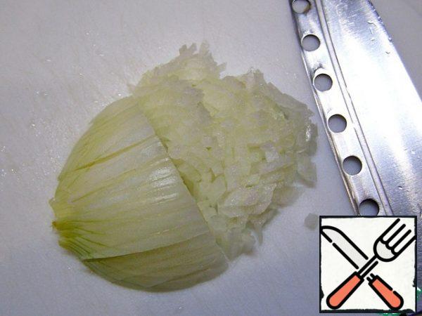 Very finely chop the onion.