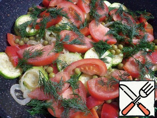 Add tomatoes and herbs. Add salt and pepper to taste and warm up for a minute, stirring gently.