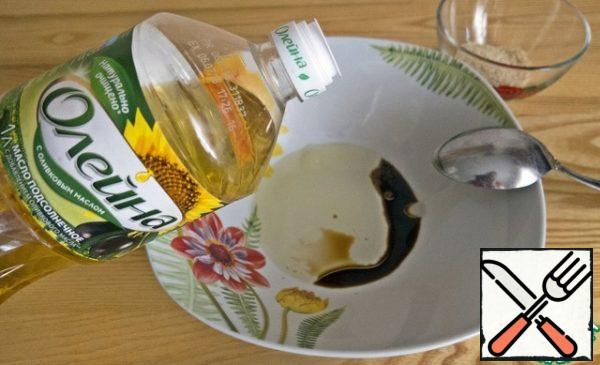 In a large bowl or immediately in a large salad bowl, mix balsamic vinegar (or wine), olive oil, sugar and salt.