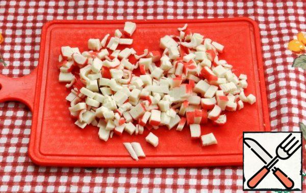 Crab sticks are also cut into cubes.
