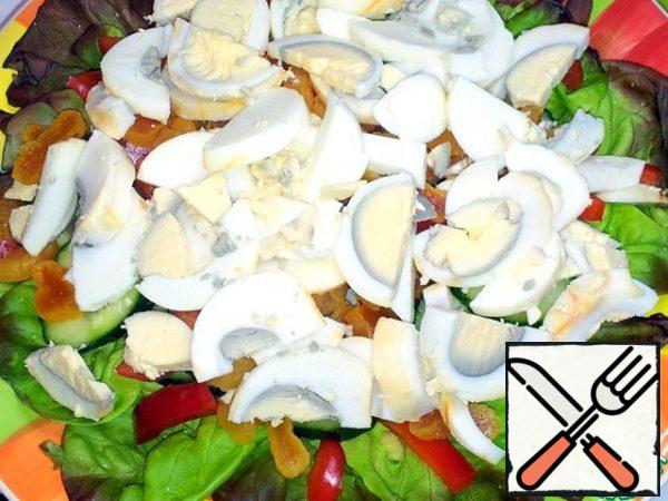 Slice the boiled eggs.