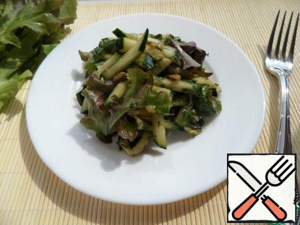 We put them on plates and serve our salad.