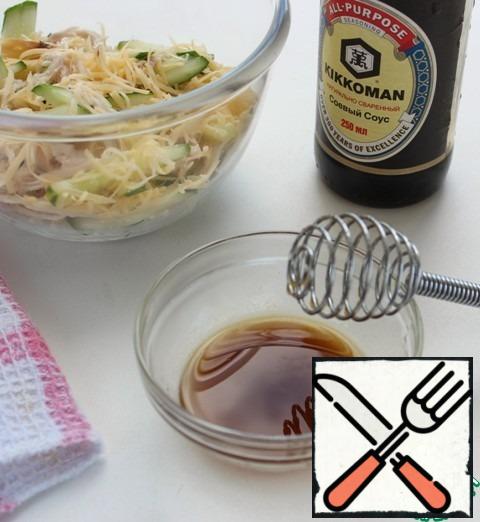 Lightly whisk the dressing with a fork or whisk.