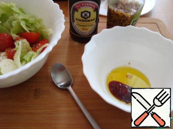 Add soy sauce to the oil.