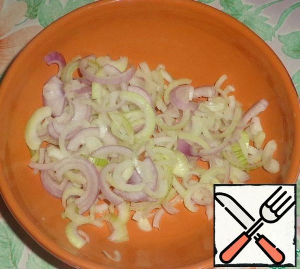 Juicy salad with onions, boiled eggs and fresh cucumber.