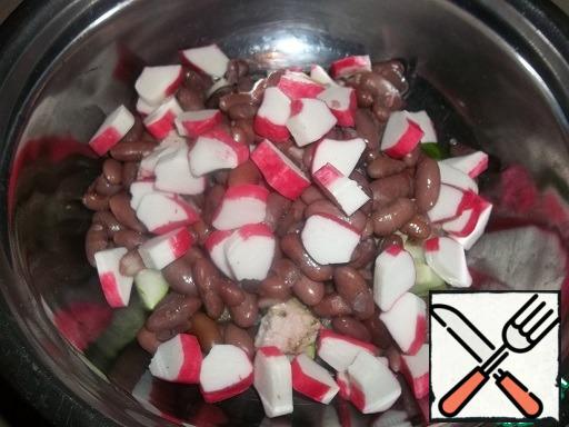 Add the beans ( I have boiled) and chopped crab sticks.