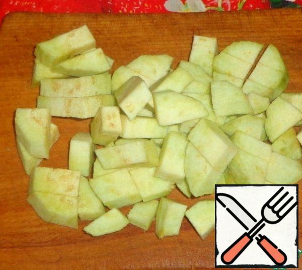 Peel the eggplant and cut into cubes.