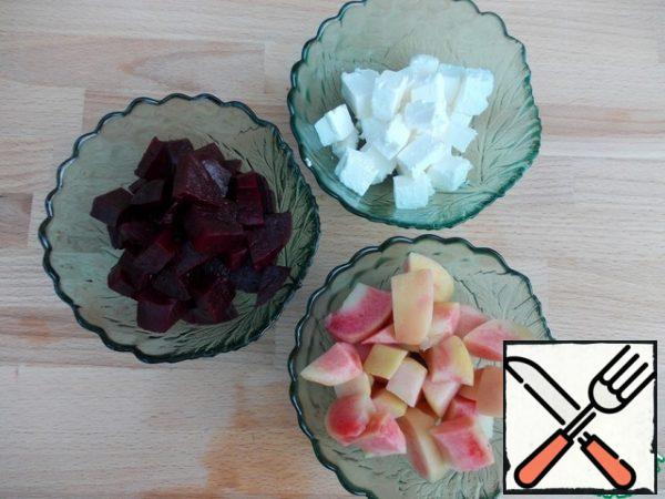 Cheese, peaches and beets cut into cubes.