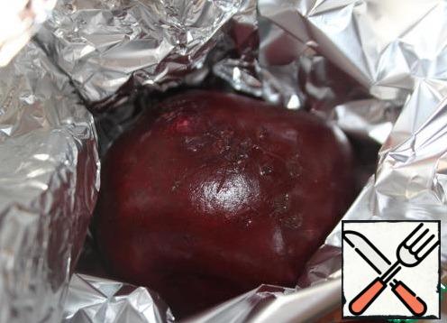 Wrap the beets in foil and bake in the oven until ready.