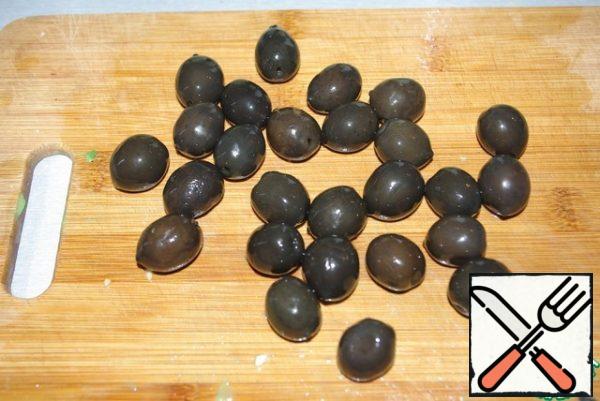 Olives (without seeds!) can be green -drain the juice and cut in half.