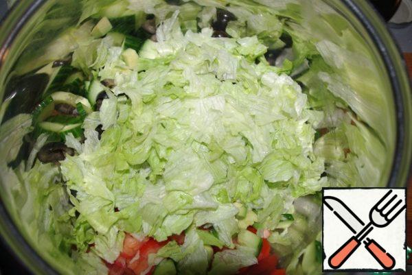 Iceberg lettuce - I always take off the first leaf and give it to my turtle), remove the remaining few leaves and tear them with my hands (it tastes better this way)).