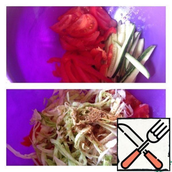 Cucumber and pepper cut into strips , tomato thin half -plates. Chop the young cabbage, add spices.