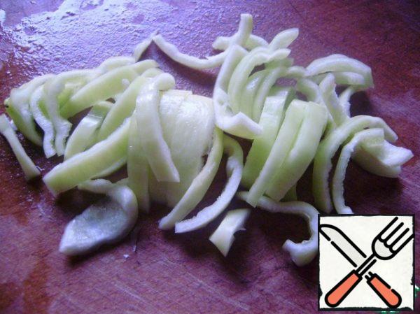 Cut the bell pepper into strips.