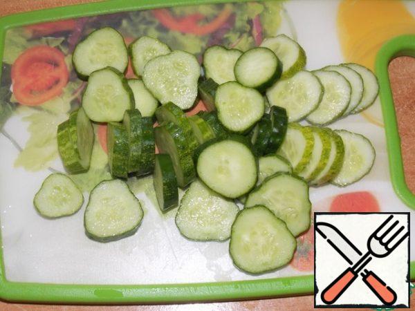 Cucumber cut into circles.