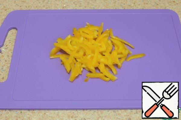 Cut the bell pepper into strips.