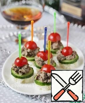 I like best to serve it as a canape: a slice of bread, a slice of cucumber, pate and half a cherry. Vegetables emphasize the taste of the pate and add a fresh touch, and these canapes look nice on the table. Bon Appetit!