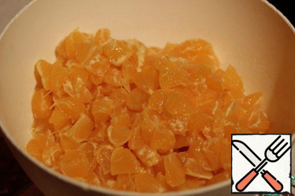 Cut the pulp into halves and remove the bones.