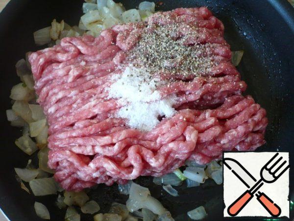 Then add ground beef, salt and ground black pepper to taste.