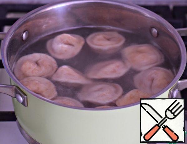 Dip the dumplings in boiling salted water and cook for 3-4 minutes after surfacing.