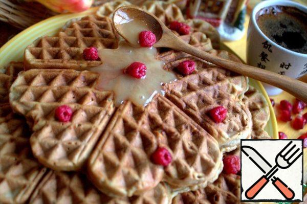 Pour condensed milk, jam or honey over the waffles.