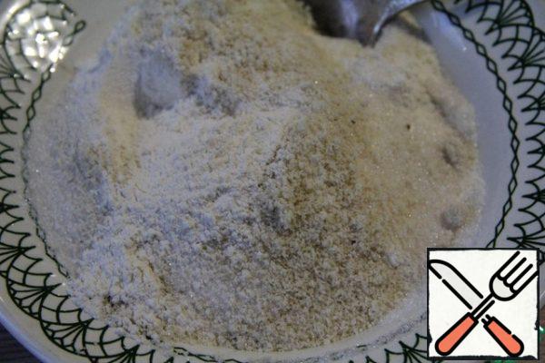 It is better to start cooking with streusel. While it cools down, you can prepare the dough for the cake.
And that's it! Cut the cold butter into cubes and mix with all the other ingredients. Rub it quickly with your hands.