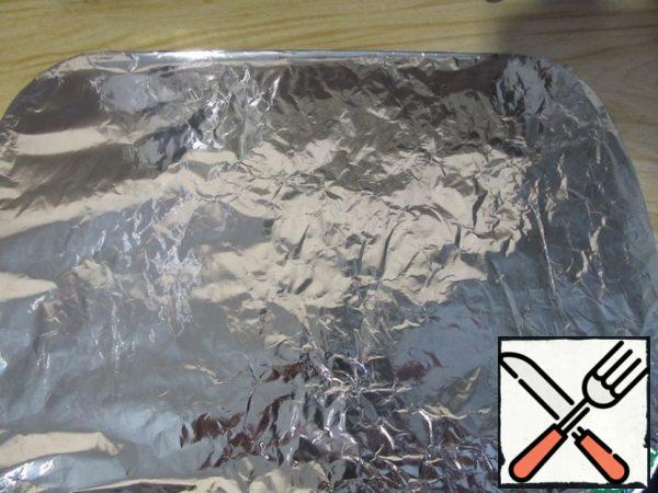 Cover the baking sheet with foil and place in a preheated 200°C oven for 30 minutes.