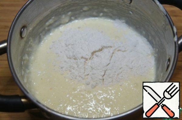 Add the flour and mix again.