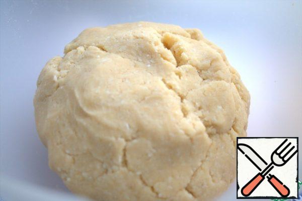 Knead the dough with your hands . Put in the refrigerator for an hour.